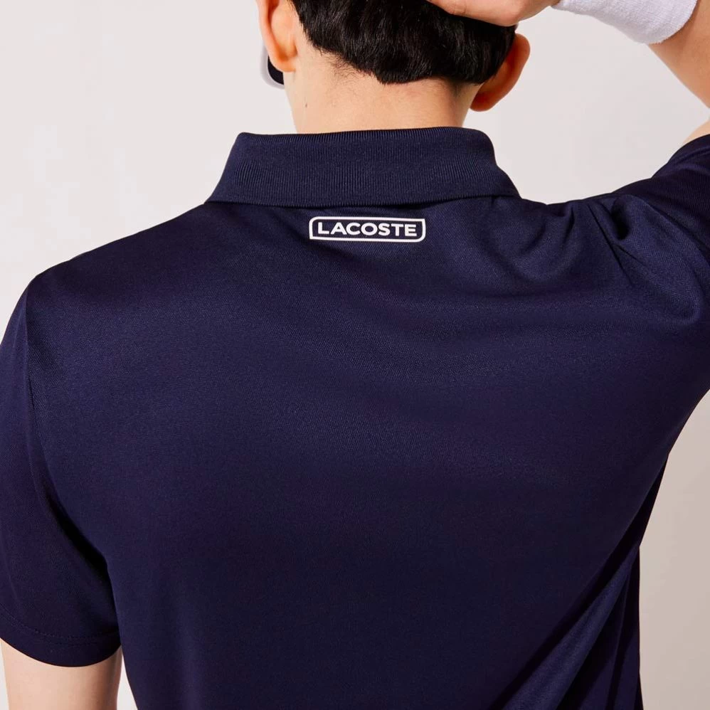 Polo Lacoste Sport Colorblock Bleu Marine / Jaune / Orange 4 Polo Lacoste Sport Colorblock Bleu Marine / Jaune / Orange – Image 2